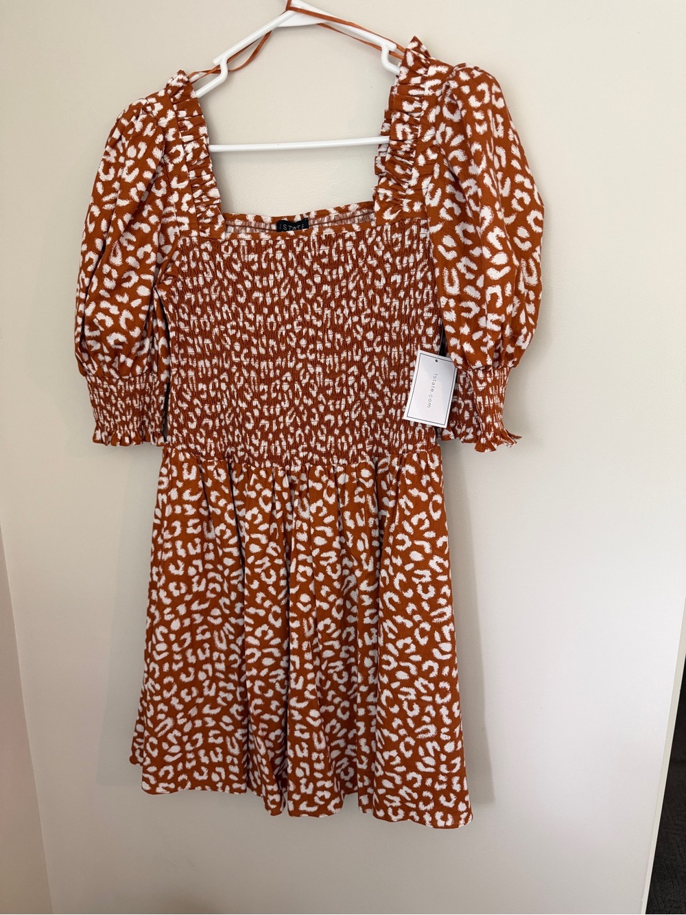 1. State Rust and White Leopard Smocked Mini Dress